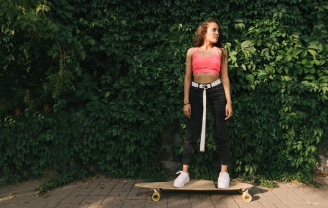 standing on a longboard